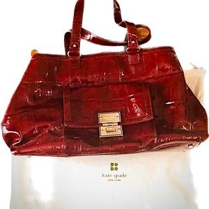 Kate Spade red patent leather large satchel with storage bag.